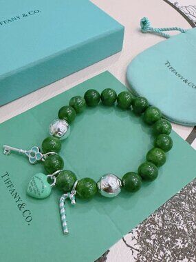 Tiffany & Co. Green Bead Bracelet with Silver Charms